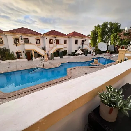 With Terrace And Pools In